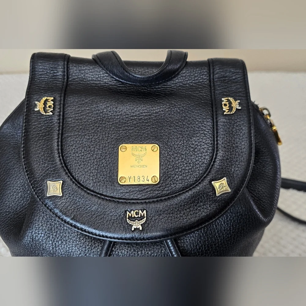 MCM Black Leather Studded Backpack Gold Hardware Drawstring Side Zip